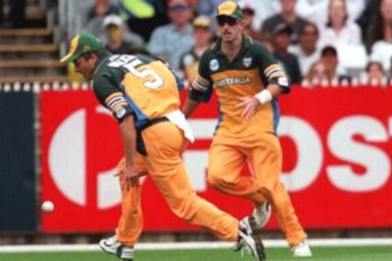 16 Jan 2000: Steve Waugh of Australia misses a catch after pulling up to avoid a collision with Damien Fleming, in the Carlton and United Series match between Australia and Pakistan, played at the Melbourne Cricket Ground, Melbourne, Australia.
