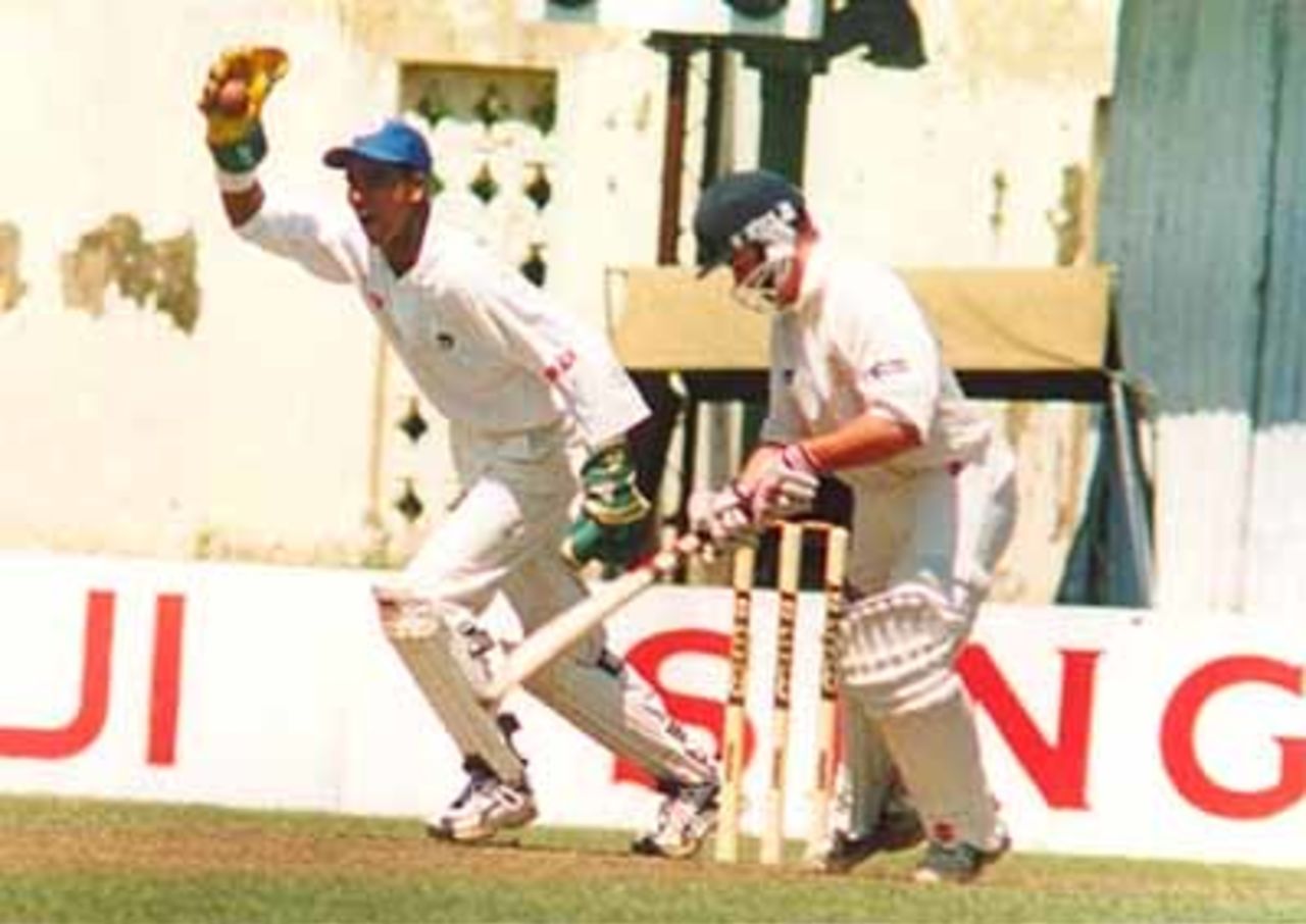 Sri Lankan keeper Pereies runs in joy after having GD Bridge (Eng) caught behind off Dhammika against England in their U-19 World Cup Super League on Jan 18, 2000.