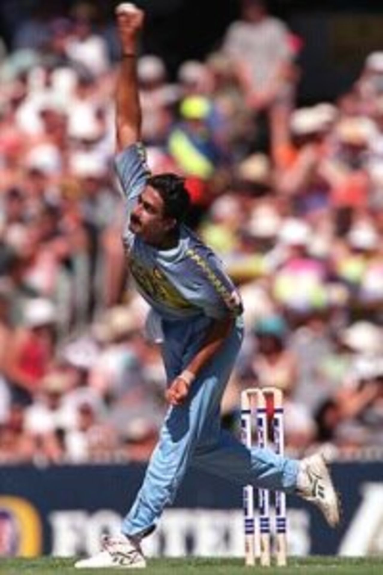12 Jan 2000: Anil Kumble of India comes in to bowl during the Carlton and United Series match between Australia and India, played at the Melbourne Cricket Ground, Melbourne, Australia.