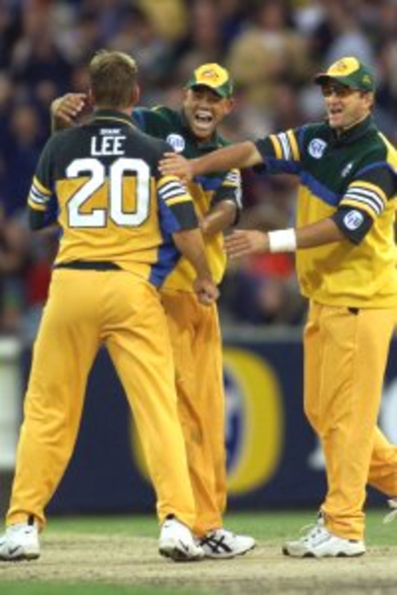 23 Jan 2000: Shane Lee of Australia celebrates with Andrew Symonds (centre) and Mark Waugh (right) after Inzamam Ul-Haq was out caught and bowled Shane Lee for five, during the one day match between Australia and Pakistan at the Melbourne Cricket Ground, Melbourne, Australia.