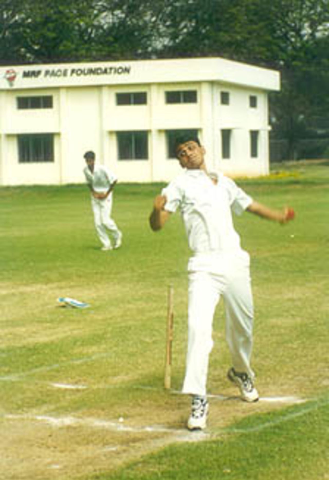 Anup Dave bowling with a classic left arm spinner's action, Pre-tournament camp at Chennai Jan 2000