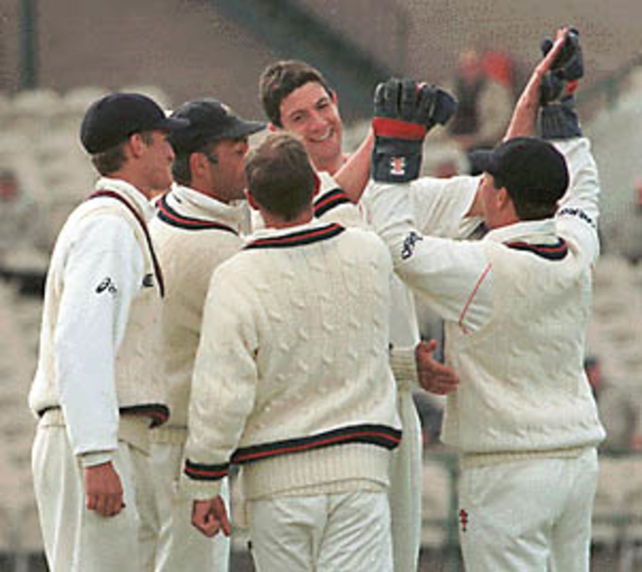 Smethurst is congratulated by his team mates, Lancashire v Sussex, County Championship, 13-16 April 1999