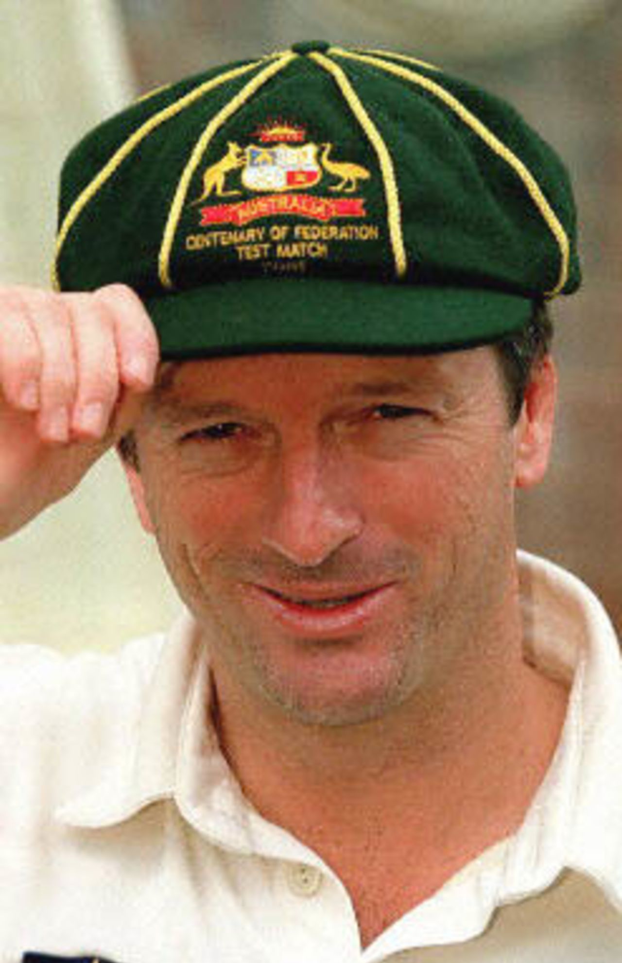 Australian cricket captain Steve Waugh wears a specially produced baggy cloth cricket cap to mark the beginning of the Centenary of Federation celebrations 01 January 2001. The Australian team will begin the fifth and final test against The West Indies at the Sydney Cricket Ground 02 January.