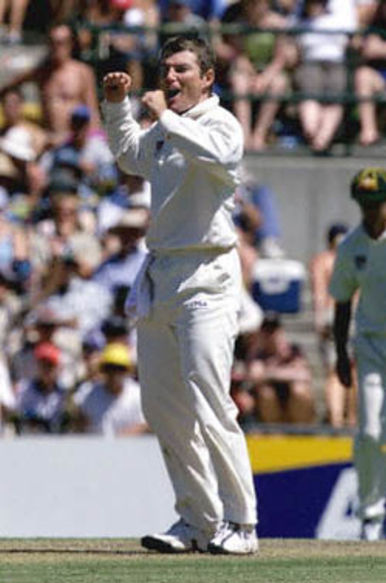 Australian leg-spinner Stuart MacGill is jubilant after taking the wicket of Sherwin Campbell in the Federation test at the Sydney Cricket ground 02 January. Campbell was caught and bowled for 79 after making the best ever West Indian partnership with Wavell Hinds at the ground.