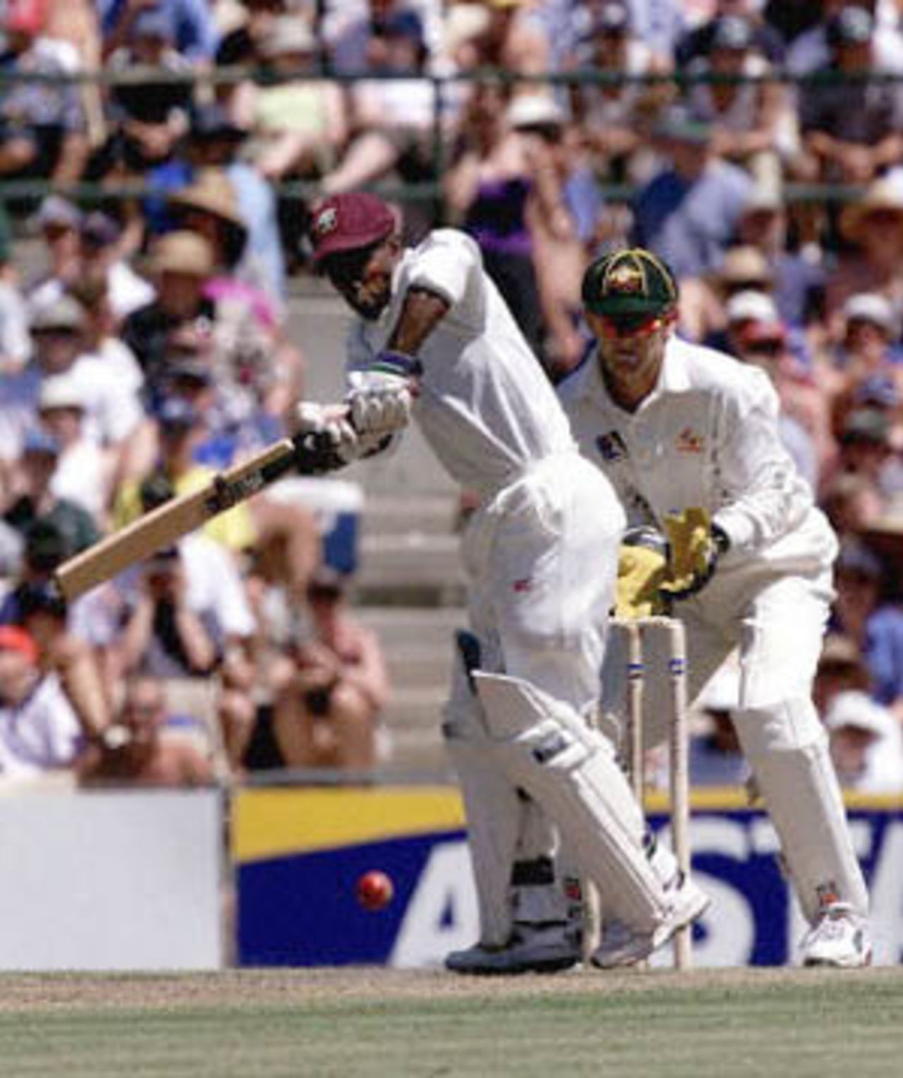 Sherwin Campbell of the West Indies drives a ball from Australia's Glen McGrath in the Federation test at the Sydney Cricket ground 02 January 2001. Campbell was caught and bowled by Stuart MacGill for 79 after making the best ever West Indian partnership with Wavell Hinds at the ground.