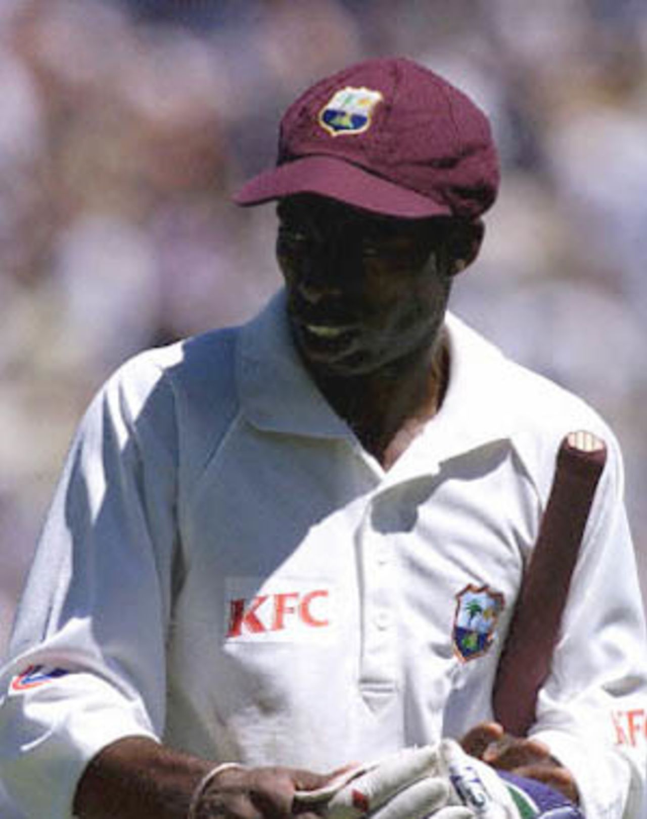 A disappointed Sherwin Campbell of the West Indies ignores the cheers of the crowd as he leaves the ground after he was caught and bowled by Stuart Macgill in the Federation test at the Sydney Cricket ground 02 January 2001. Campbell made 79 runs after making the best ever West Indian partnership with Wavell Hinds at the ground.