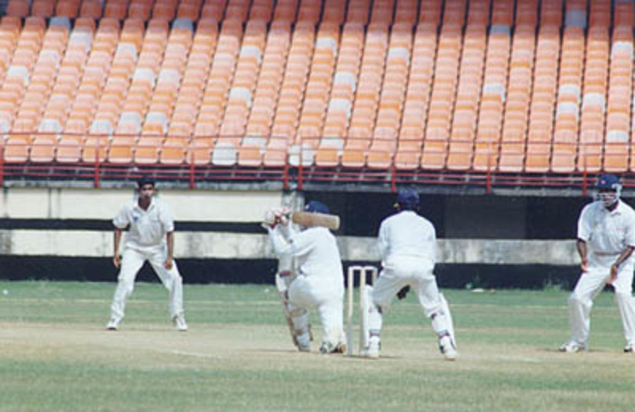 Aashish Kapoor hits Sreekumar Nair straight to Ajay Kudua at mid wicket. Ranji Trophy South Zone League, 2000/01, Kerala v Tamil Nadu, Nehru Stadium, Kochi, 29Nov-02Dec 2000.