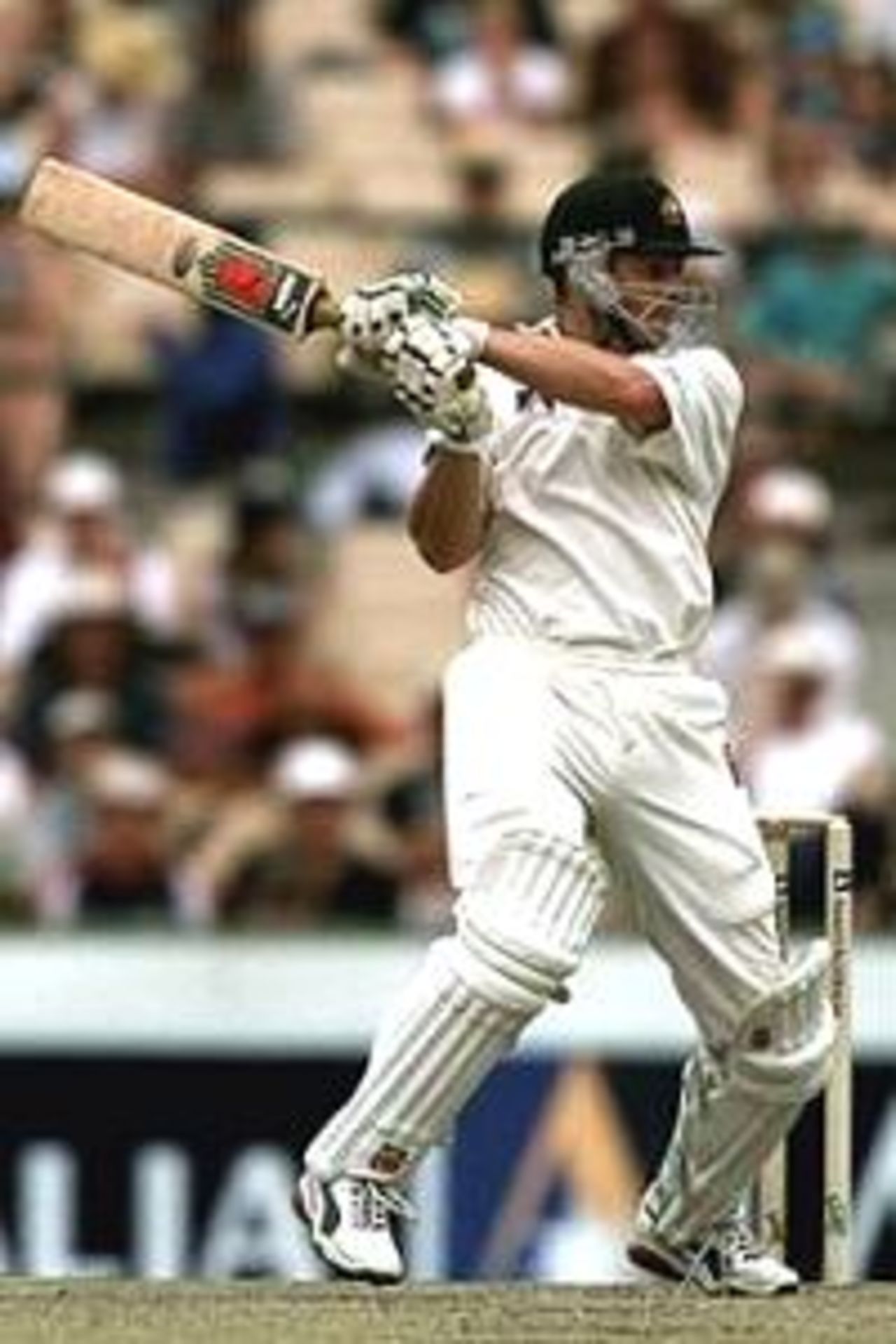 Adam Gilchrist of Australia cuts through point during his half century against the West Indies during the third days play of the Fifth Test Match between Australia and West Indies at the Sydney Cricket Ground, Sydney, Australia.