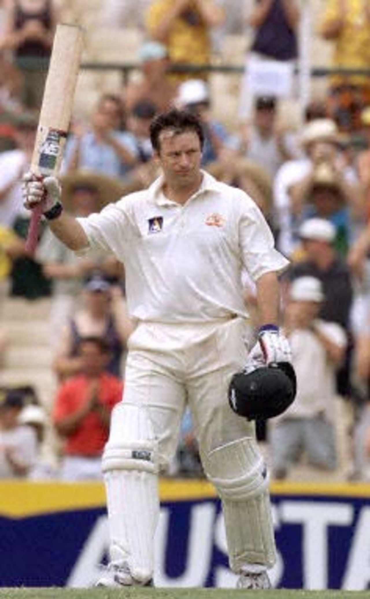 Australian captain Steve Waugh acknowledges the cheers of the crowd on making a century in the Federation test at the Sydney Cricket ground 04 January 2001. Waugh is now the fifth highest century taker in cricketing history.