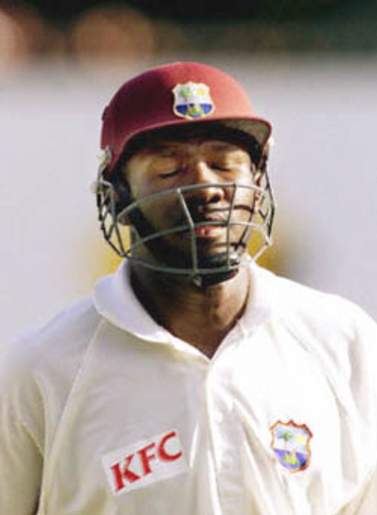 Wavell Hinds of the West Indies leaves the leaves the dejected at the end of the second day in the Federation test at the Sydney Cricket ground 04 January 2001. Hinds was cleaned bowled by Australian fast bowler Glenn McGrath for 46 runs.