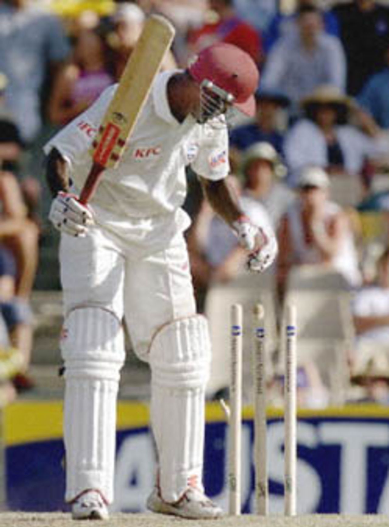 Batsman Wavell Hinds of the West Indies is clean-bowled by Australian fast-bowler Glenn McGrath in the Federation test at the Sydney Cricket ground 04 January. At close of play on the third day the West Indies were 1-97.