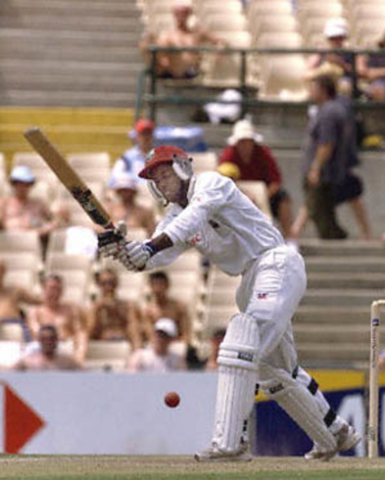 Sherwin Campbell of the West Indies drives a ball off the bowling of Glenn McGrath in the Federation test at the Sydney Cricket ground 05 January 2001. Campbell made 54 before being caught by Australian wicket-keeper Adam Gilchrist off the bowling of Jason Gillespie.