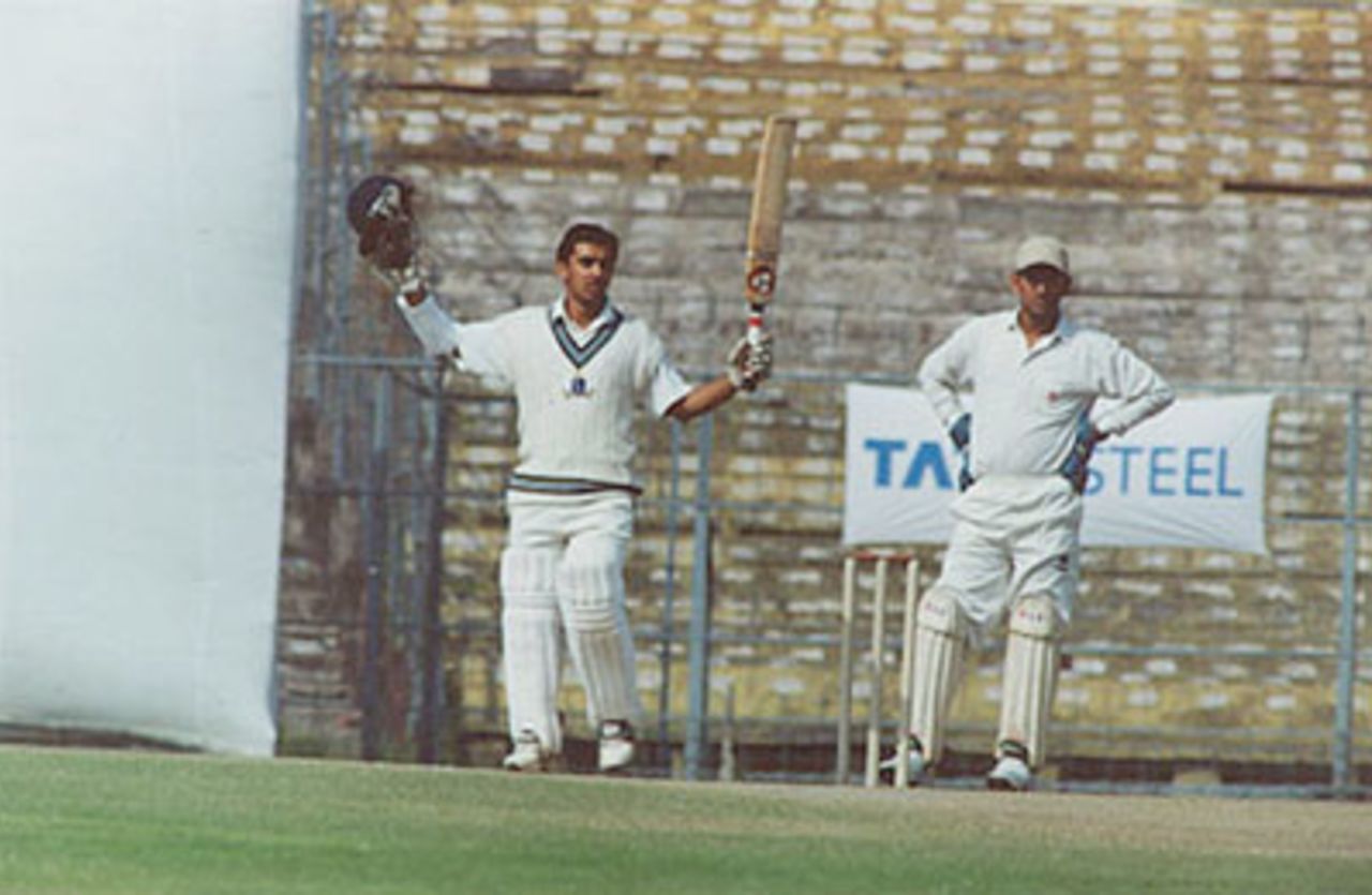 Rohan Gavaskar acknowledges the dressing room after reaching his century, Ranji Trophy East Zone League, 2000/01, Bengal v Bihar, Eden Gardens, Calcutta, 03-06 January 2001.