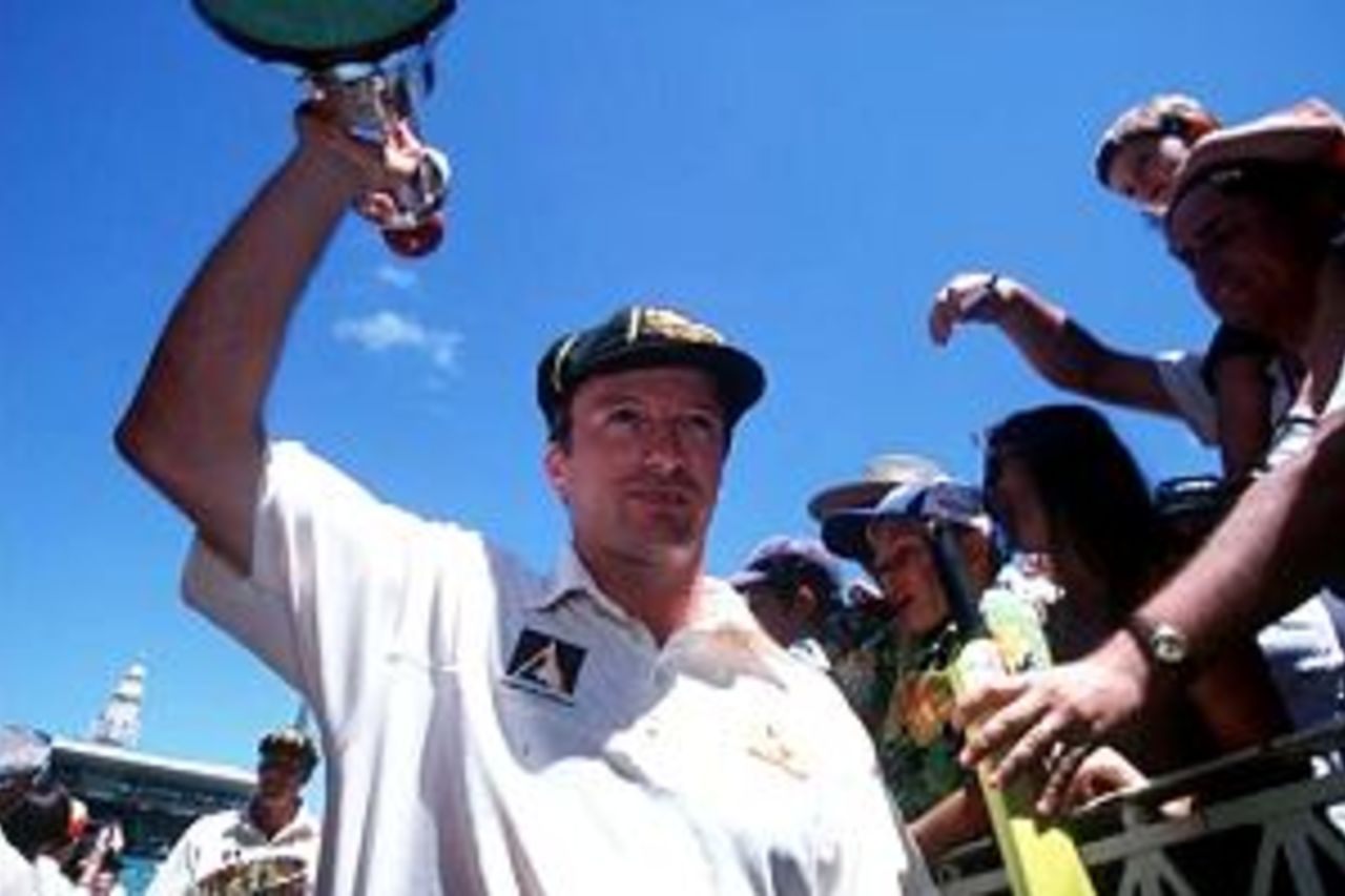 Steve Waugh of Australia carries the Sir Frank Worrell Trophy off the ground after winning the Federation Test against the West Indies at the Sydney Cricket Ground in Sydney, Australia.