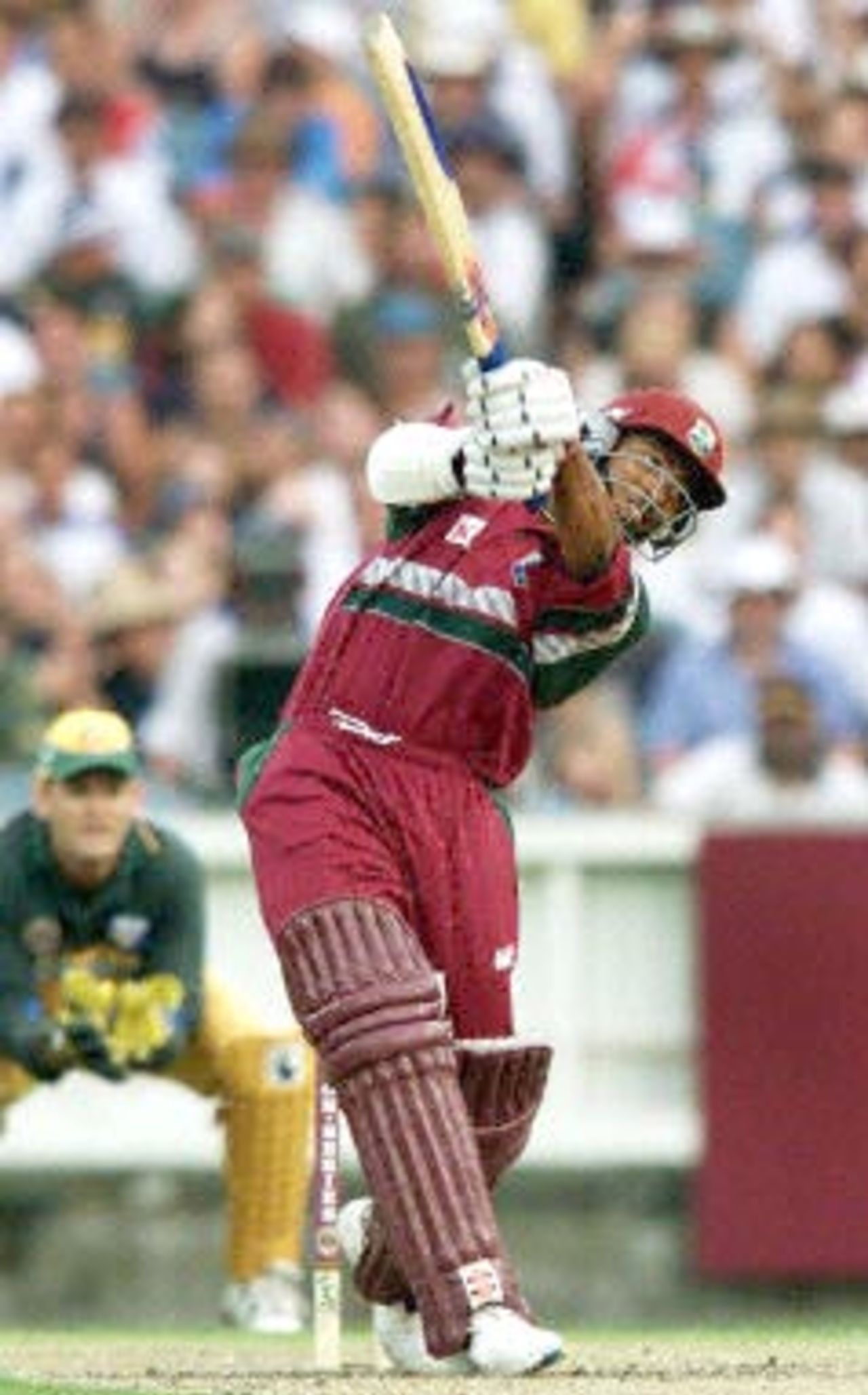West Indies batsman Brian Lara hits out against the Australian bowling in their match at the MCG in Melbourne, 11 January 2000. Australia scored 267-6 off their 50 overs and then restricted the West Indies to 193-7 from their 50 overs to go one up in the tri-nations series which also includes Zimbabwe