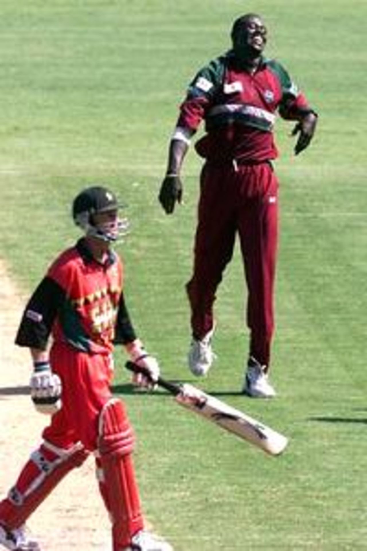 Cameron Cuffy of the West Indies gets the wicket of Grant Flower of Zimbabwe caught behind,Cuffy finished with the figures of 4/24 during the one day International between Zimbabwe and the West Indies played at the Sydney Cricket Ground,Sydney,Australia