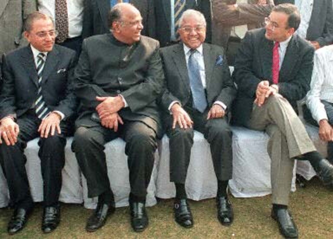 Former International Cricket Council President Jagmohan Dalmiya (L) President of Bombay Cricket Association and senior political leader Sharad Pawar (2nd from L), President of Board of Control of Cricket in India (BCCI) A.C. Muthiah (2nd from R) and Indian Law Minister Arun Jaitley (R) share a joke while posing for photographers during a photo-shoot after a meeting of the Indian Cricket board in New Delhi 22 January 2001. India's cricket chiefs overcame dissent in their ranks to finally announce details of the Australian tour, barely three weeks before the tourists arrive in India.