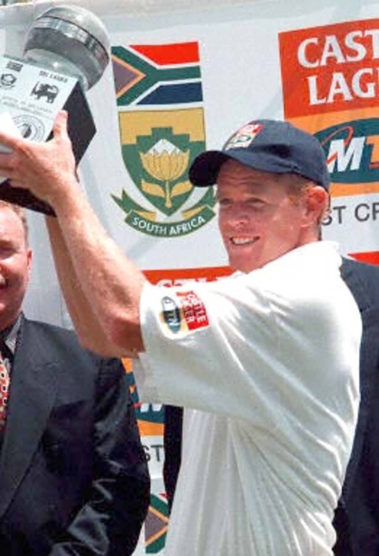 South African captain Shaun Pollock holds aloft the series trophy at the end of the third and final five day international played at Centurion Park, Pretoria 22 Januray 2001.