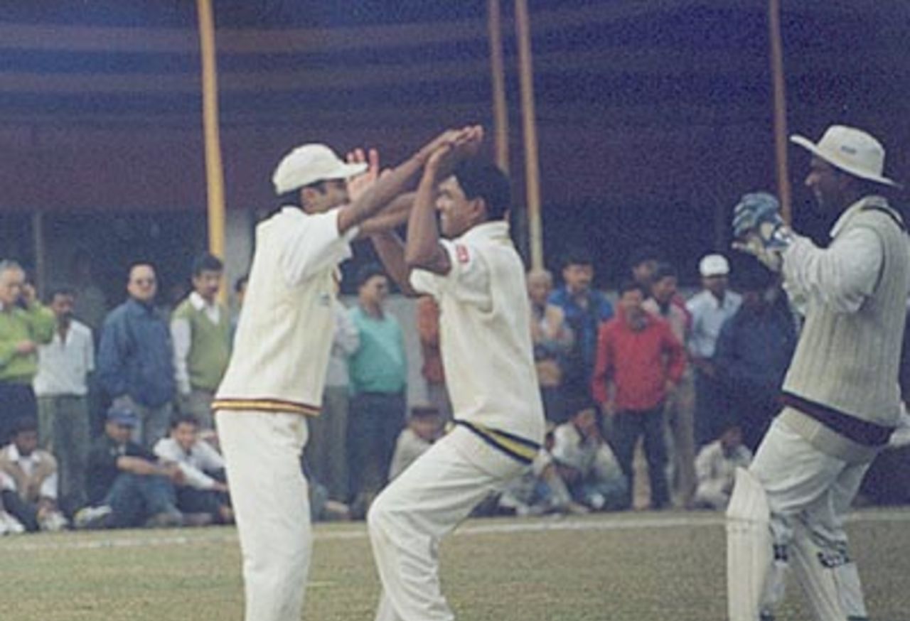 Sanjay Satpathy celebrates the fall of S Ghosh. Ranji Trophy East Zone League 2000-01, Assam v Orissa Tinsukia District Sports Association Stadium, 4-6 Jan 2001
