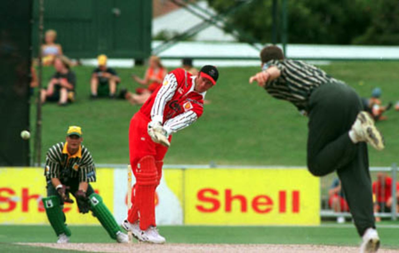 Canterbury batsman Chris Harris clips a ball off his legs through square leg from the bowling of Central Districts pace bowler Brent Hefford during his innings 51. Wicket-keeper Bevan Griggs looks on. 1st Shell Cup Final: Central Districts v Canterbury at McLean Park, Napier, 24 January 2001.