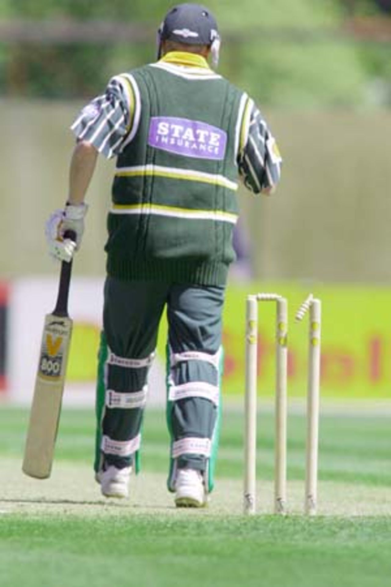 High winds early in the match called for a sticky solution to attach the bails ... chewing gum. Mathew Sinclair is the unsuspecting batsman. 2nd Shell Cup Final: Canterbury v Central Districts at Jade Stadium, Christchurch, 27 January 2001.