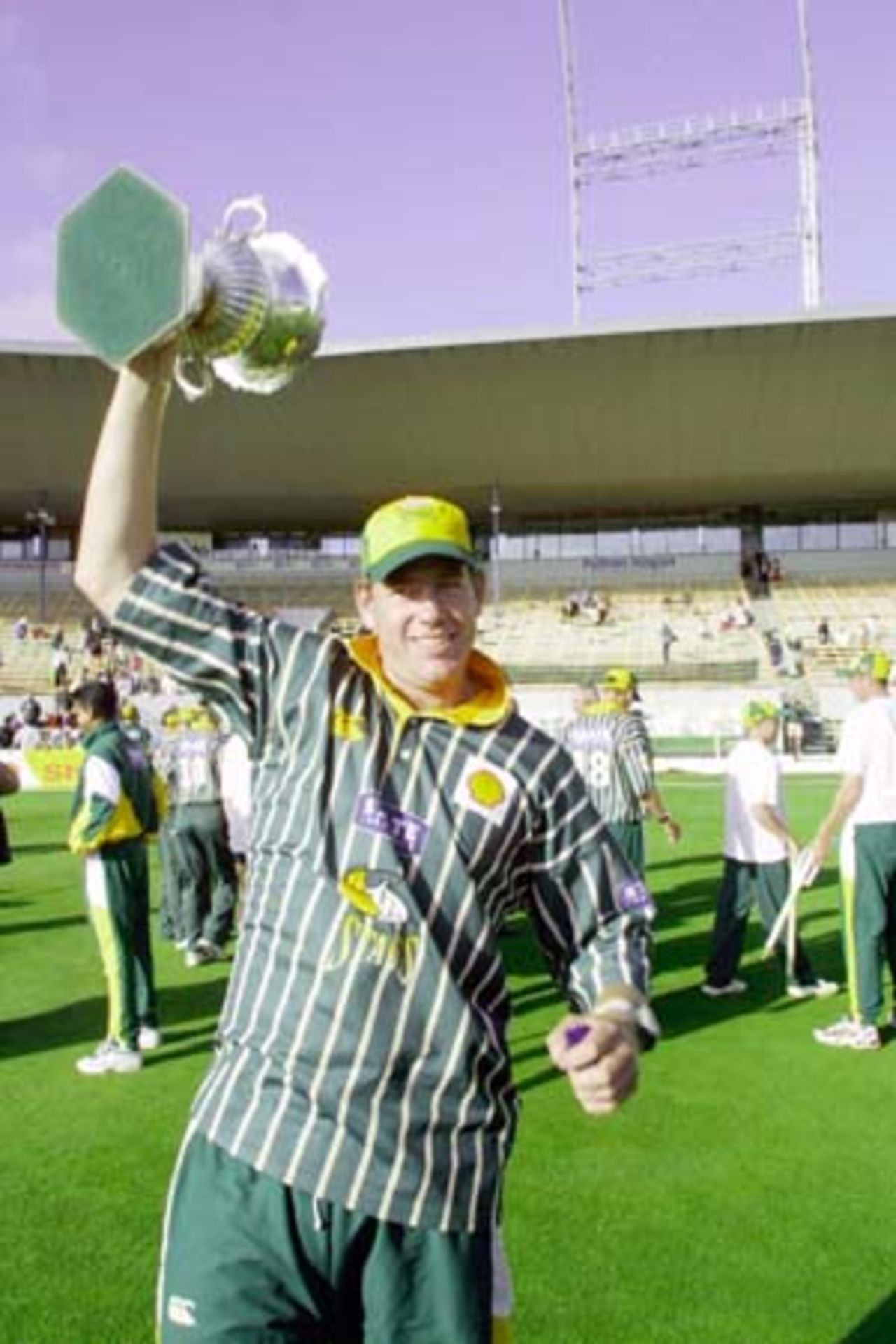Victorious captain Jacob Oram holds the Shell Cup aloft after Central Districts won the third final by eight wickets to take the best-of-3-finals series 2-1. It is their first Shell Cup title since the 1984/85 season. 3rd Shell Cup Final: Canterbury v Central Districts at Jade Stadium, Christchurch, 28 January 2001.