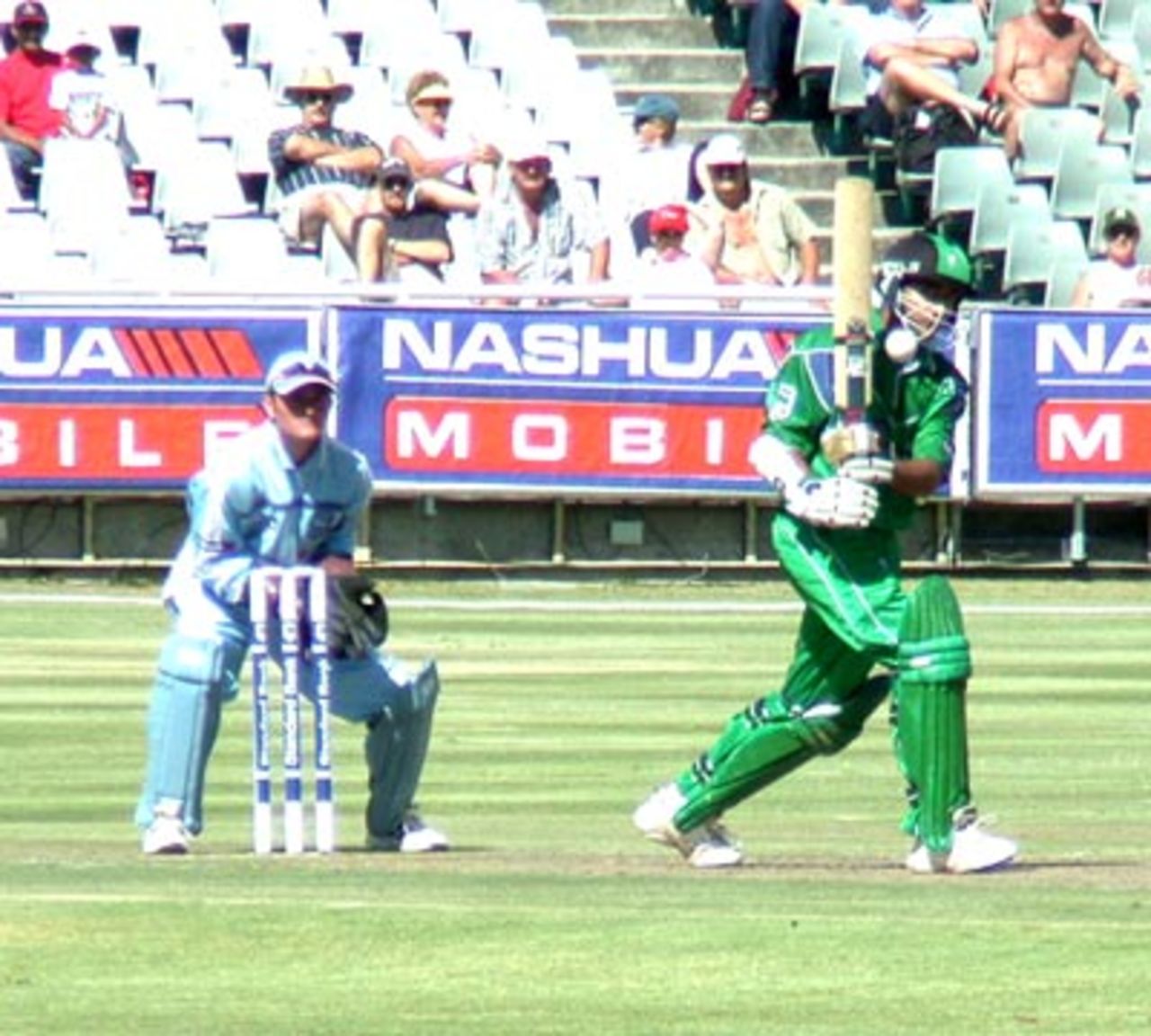 Dolphin's opening bat Goolam Bodi plays a ball to the legside against the Titans