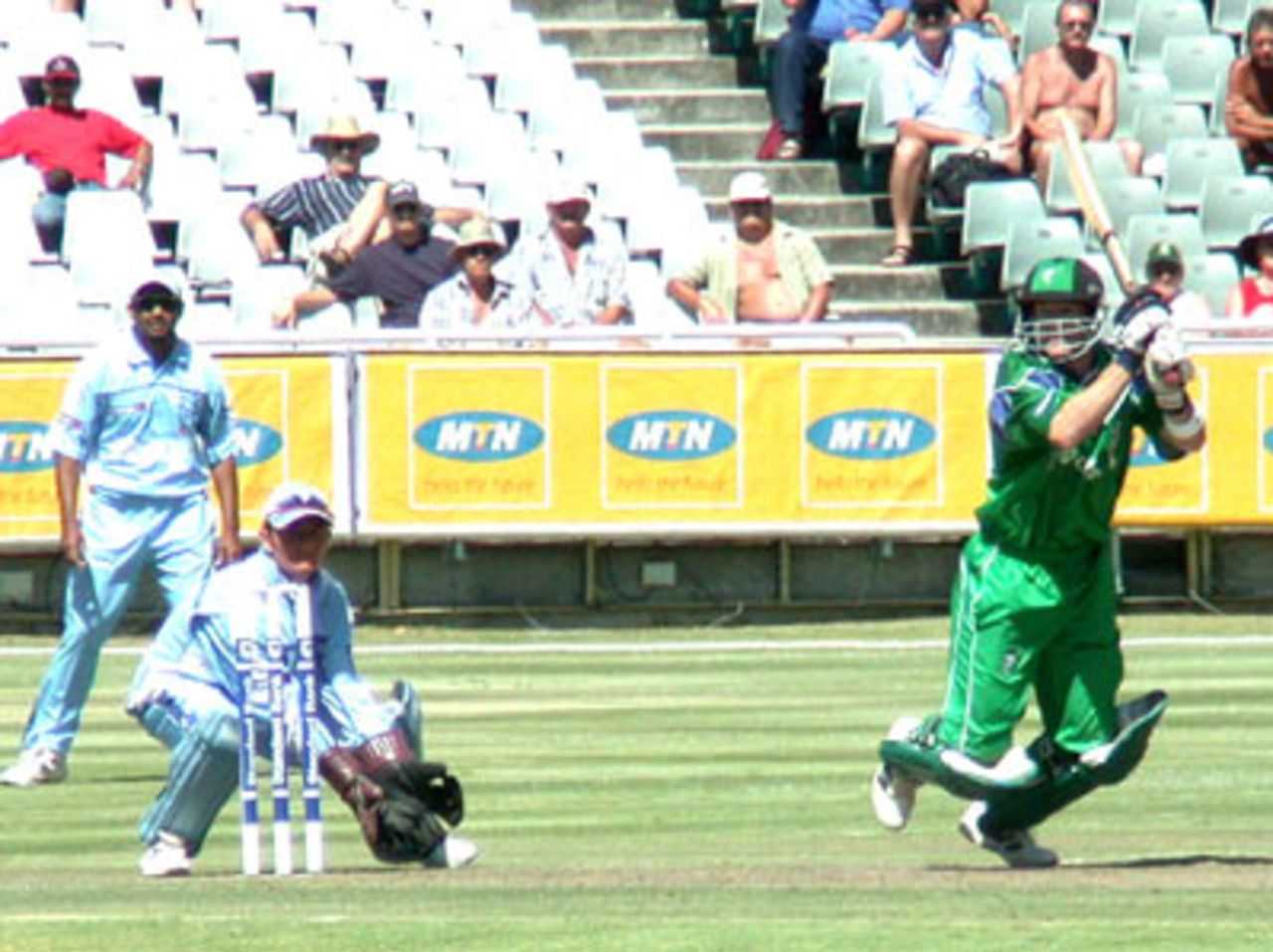 Jonty Rhodes sets off on a run after playing a ball into the covers