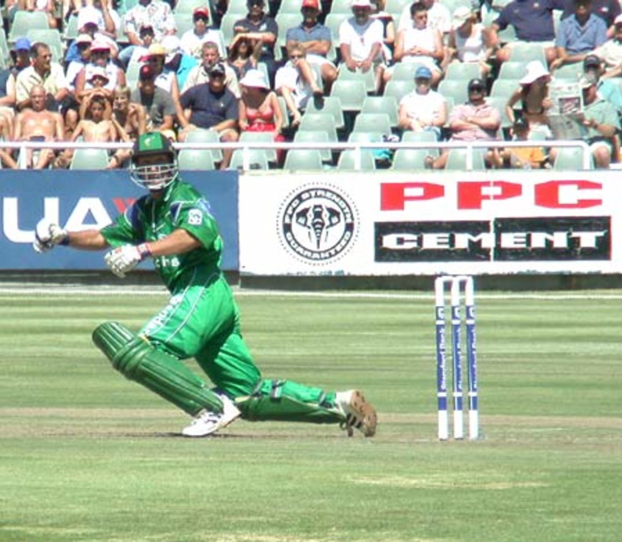 Doug Watson loses his bat as he flicks a ball to the fine leg boundary