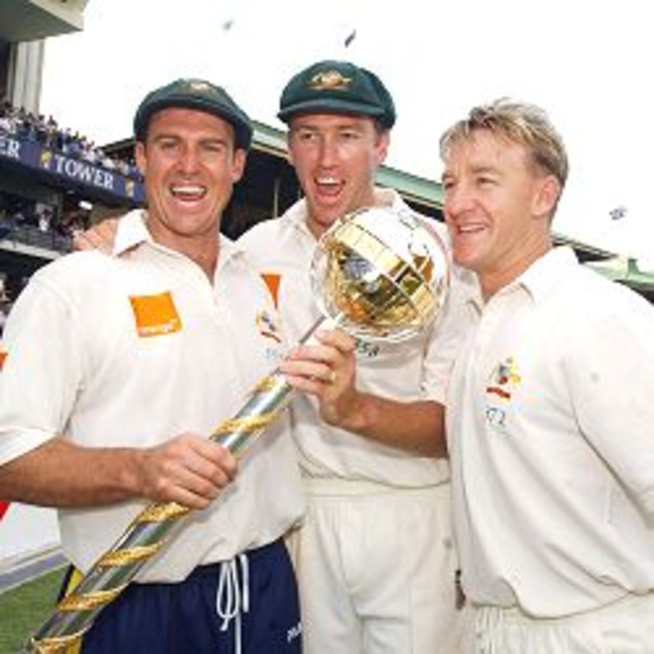 05 Jan 2002: Matthew hayden, Glenn McGrath and 12th man Andy Bichel celebrate Australia's win during the fourth day's play in the third test match between Australia and South Africa held at the Sydney Cricket Ground, Sydney, Australia.