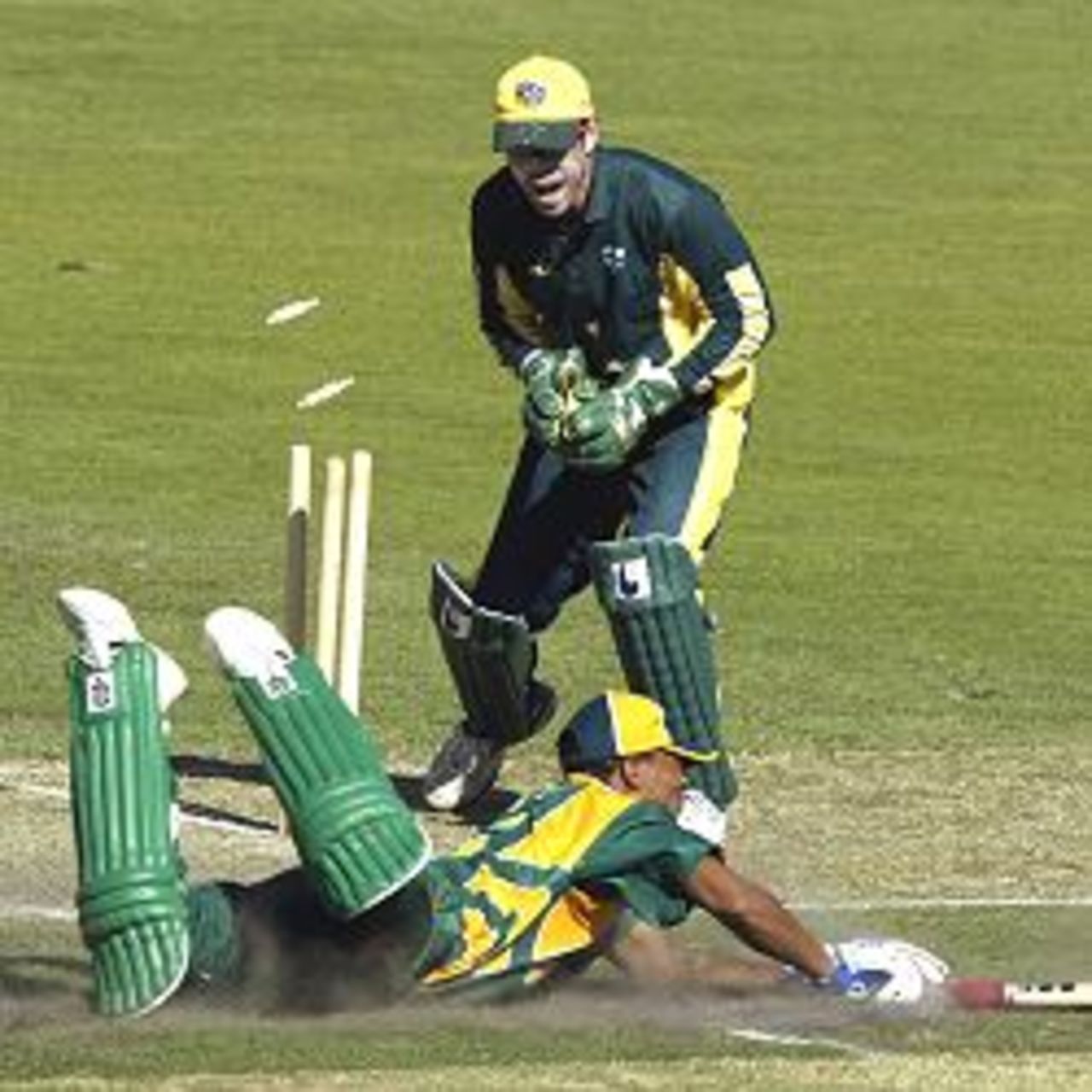 10 Jan 2002: Ryan Campbell of Australia A unsuccessfully attempts to run out Makhaya Ntini of South Africa off the last ball of the innings, during the One Day match between Australia A and South Africa, played at the Adelaide Oval, Adelaide, Australia.