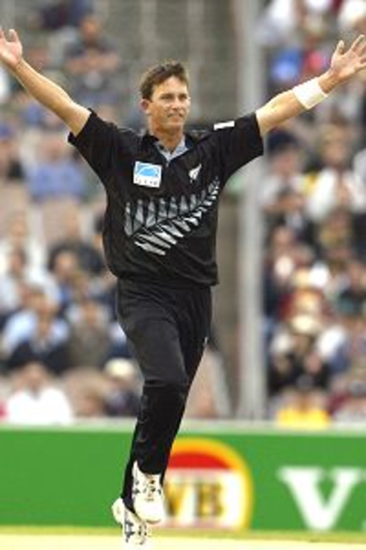 11 Jan 2002: Shane Bond of New Zealand celebrates the wicket of Mark Waugh, during the VB Series One Day International between Australia and New Zealand, played at the Melbourne Cricket Ground, Melbourne, Australia.