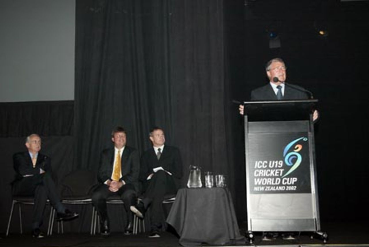 New Zealand deputy prime minister Jim Anderton delivers a speech at the ICC Under-19 World Cup opening ceremony at the Christchurch Convention Centre. ICC president Malcolm Gray (left), New Zealand Cricket chief executive Martin Snedden and emcee Eric Young look on. 14 January 2002.