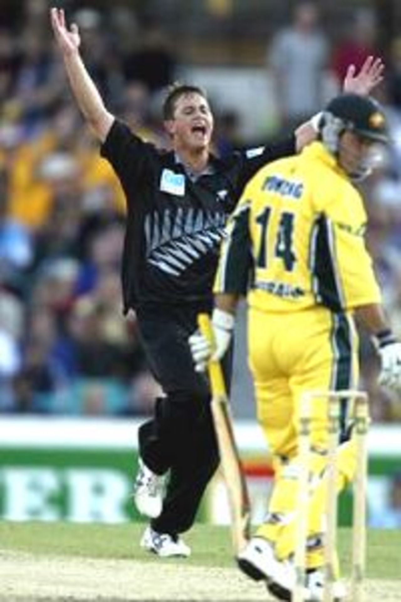 17 Jan 2002: Shane Bond of New Zealand claims the wicket of Ricky Ponting of Australia during the VB Series match between Australia and New Zealand being played at the Sydney Cricket Ground ,Sydney ,Australia.