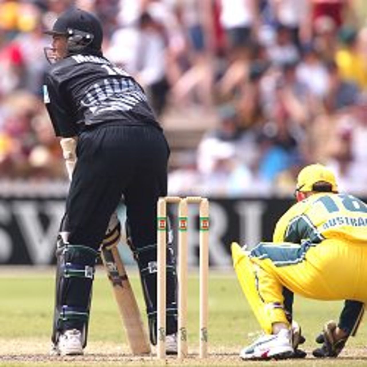 26 Jan 2002: Craig McMillan of New Zealand faces up to Mark Waugh of Australia side on, during the VB Series One Day International between Australia and New Zealand played at the Adelaide Oval, Adelaide, Australia.