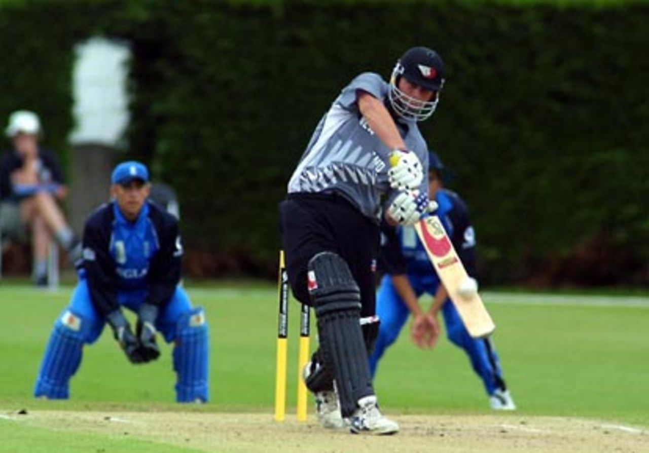 New Zealand Under-19 batsman Jesse Ryder lofts a delivery over mid off during his innings of 54. England Under-19 wicket-keeper Stephen Pope and slip fielder Kadeer Ali (obscured) look on. ICC Under-19 World Cup Super League Group 2: England Under-19s v New Zealand Under-19s at Lincoln No. 3, Lincoln, 28 January 2002.