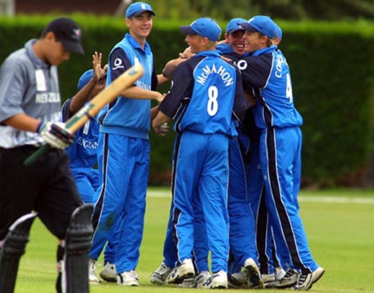 New Zealand Under-19 batsman Ross Taylor (left) walks from the field as England Under-19 players celebrate his dismissal, caught by Nicky Peng from the bowling of Gordon Muchall for one. ICC Under-19 World Cup Super League Group 2: England Under-19s v New Zealand Under-19s at Lincoln No. 3, Lincoln, 28 January 2002.