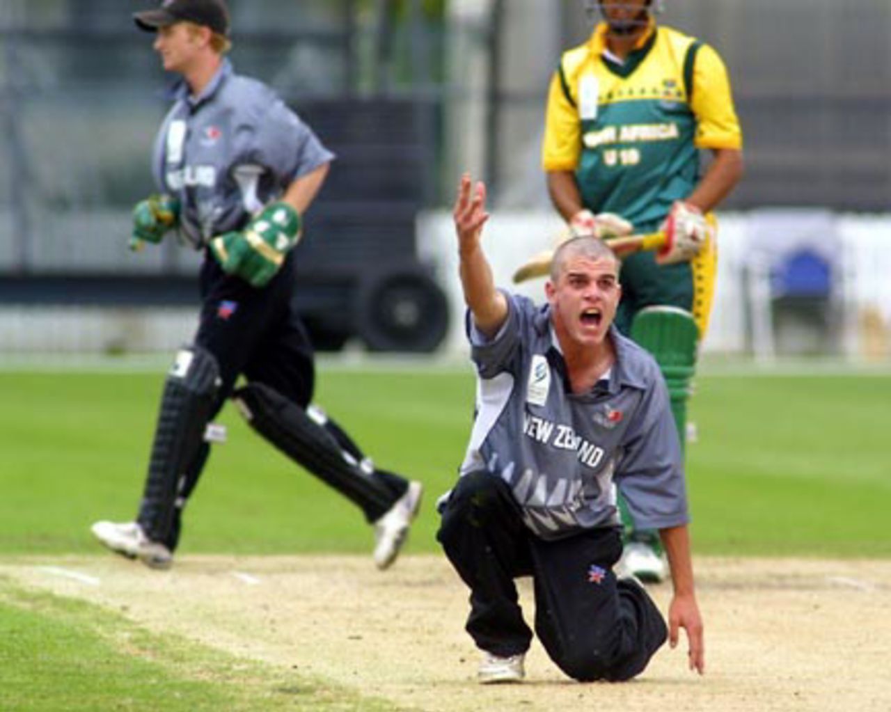 New Zealand Under-19 bowler Peter Borren unsuccessfully appeals for lbw against South Africa Under-19 batsman Hashim Amla during his spell of 3-34 from 10 overs. Wicket-keeper Ian Sandbrook follows the path of the ball in the background. ICC Under-19 World Cup Super League Group 2: New Zealand Under-19s v South Africa Under-19s at Lincoln Green, Lincoln, 30 January 2002.