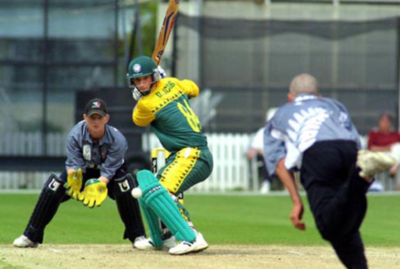South Africa Under-19 batsman David Jacobs shapes to cut a delivery from New Zealand Under-19 bowler Peter Borren during his innings of 63. Wicket-keeper Ian Sandbrook looks on. ICC Under-19 World Cup Super League Group 2: New Zealand Under-19s v South Africa Under-19s at Lincoln Green, Lincoln, 30 January 2002.