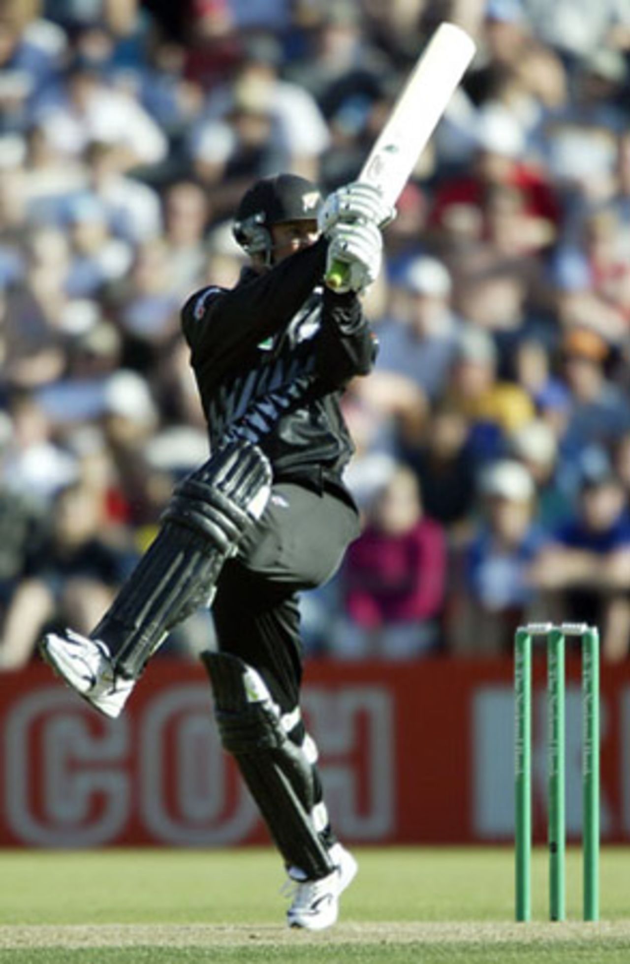 New Zealand batsman Nathan Astle pulls a delivery behind square on the leg side during his innings of 32. 3rd ODI: New Zealand v India at Jade Stadium, Christchurch, 1 January 2003.