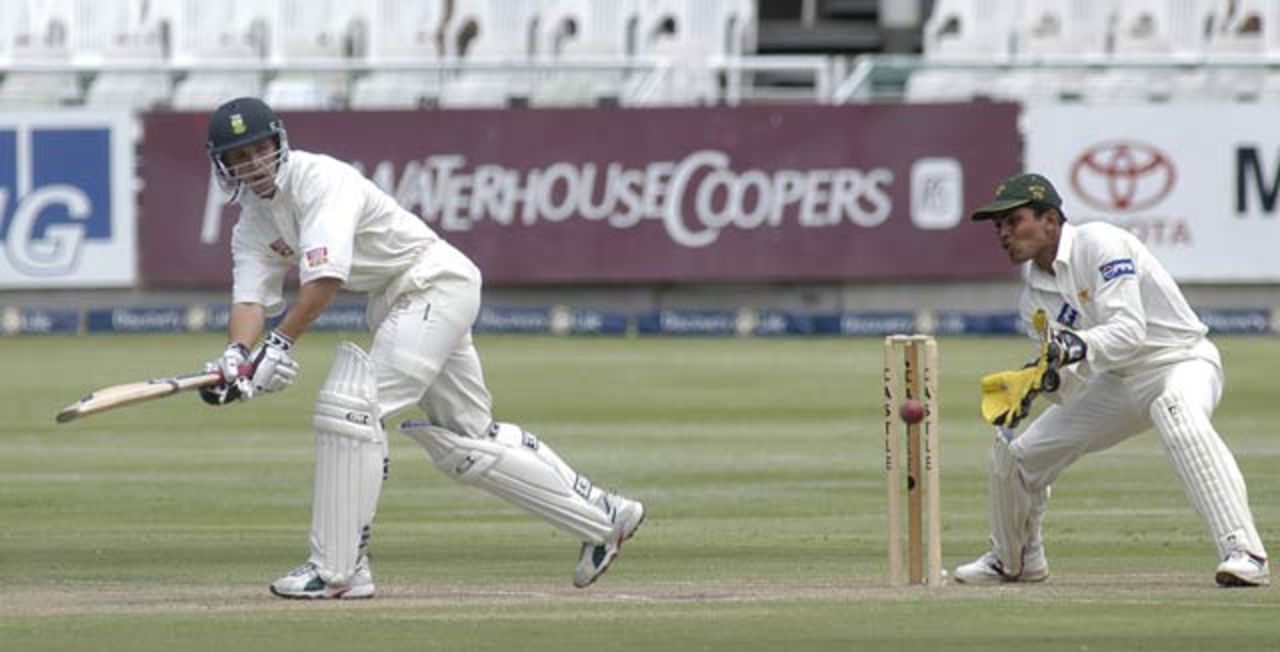 Boeta Dippenaar plays to leg during his innings of 62 against Pakistan with Kamran Akmal looking on