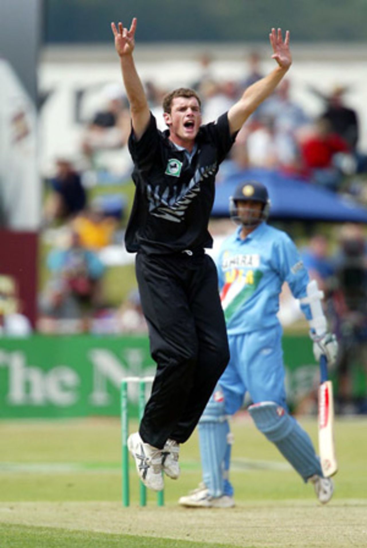 New Zealand bowler Kyle Mills unsuccessfully appeals for lbw against Indian batsman Rahul Dravid during his spell of 1-28 from 10 overs. 4th ODI: New Zealand v India at John Davies Oval, Queenstown, 4 January 2003.