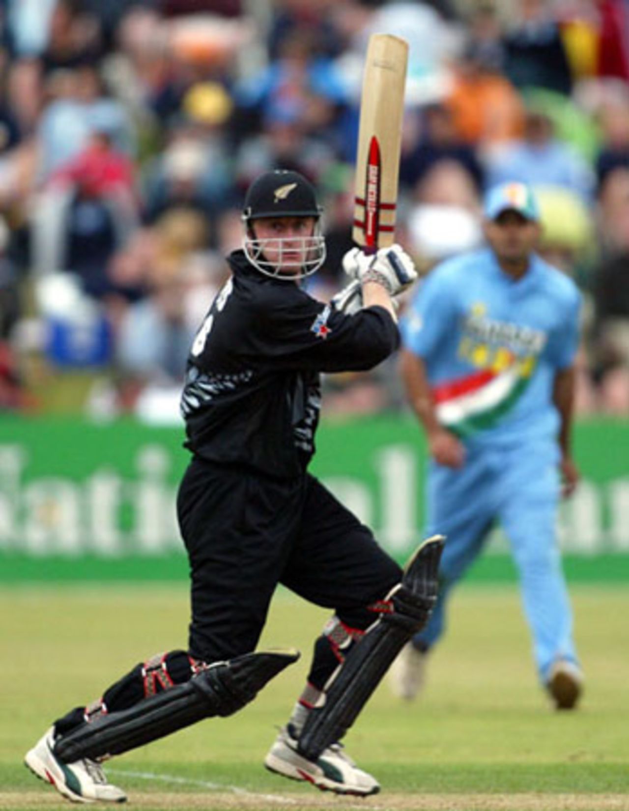 New Zealand batsman Scott Styris cuts a delivery through backward point during his innings of eight not out. 4th ODI: New Zealand v India at John Davies Oval, Queenstown, 4 January 2003.
