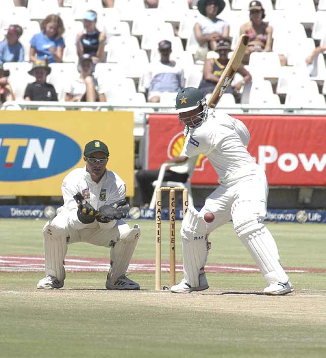 Pakistan's Faisal Iqbal prepares to cut a Nicky Boje delivery at Newlands
