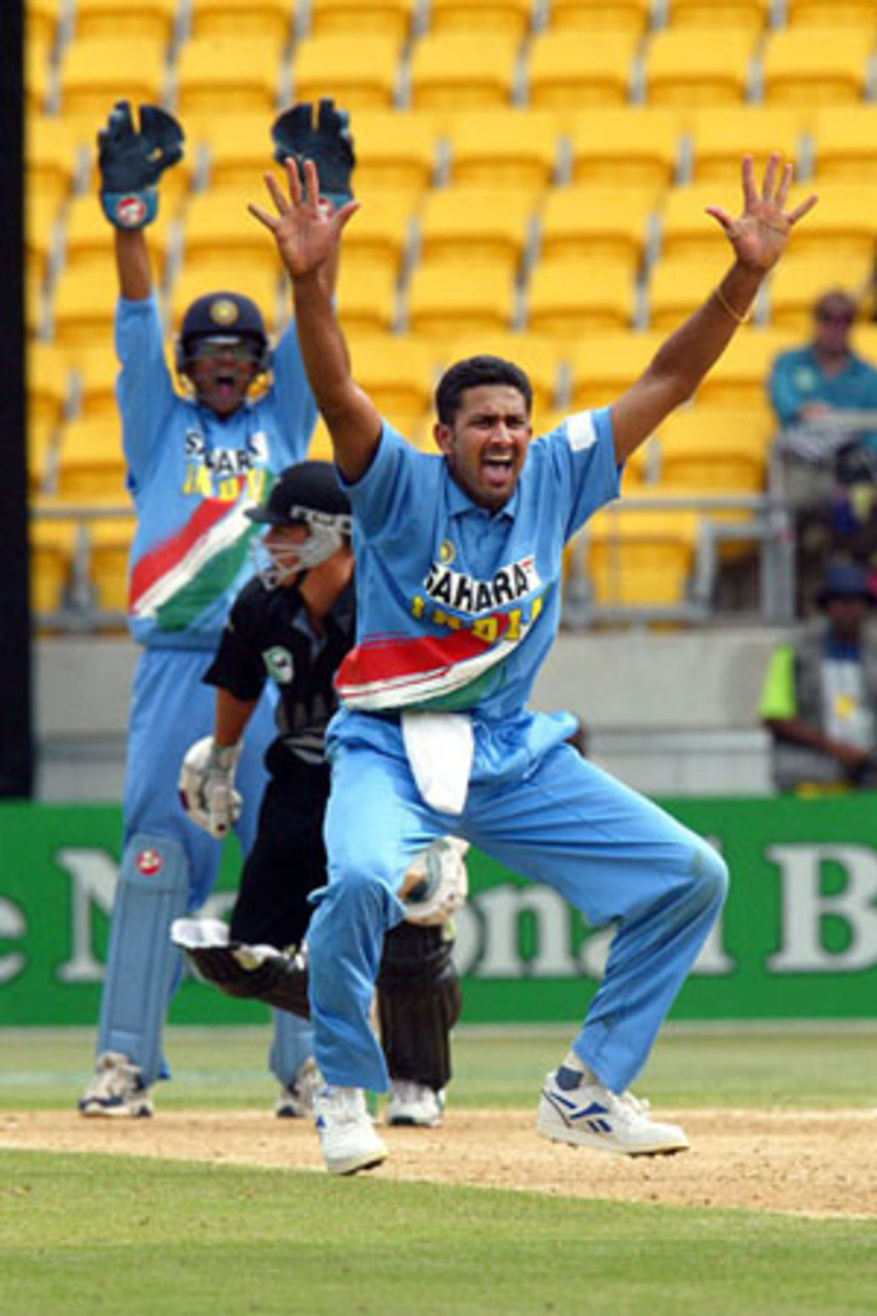 Indian bowler Anil Kumble successfully appeals for lbw to dismiss New Zealand batsman Shane Bond for 0. Wicket-keeper Rahul Dravid joins in the appeal in the background. 5th ODI: New Zealand v India at Westpac Stadium, Wellington, 8 January 2003.