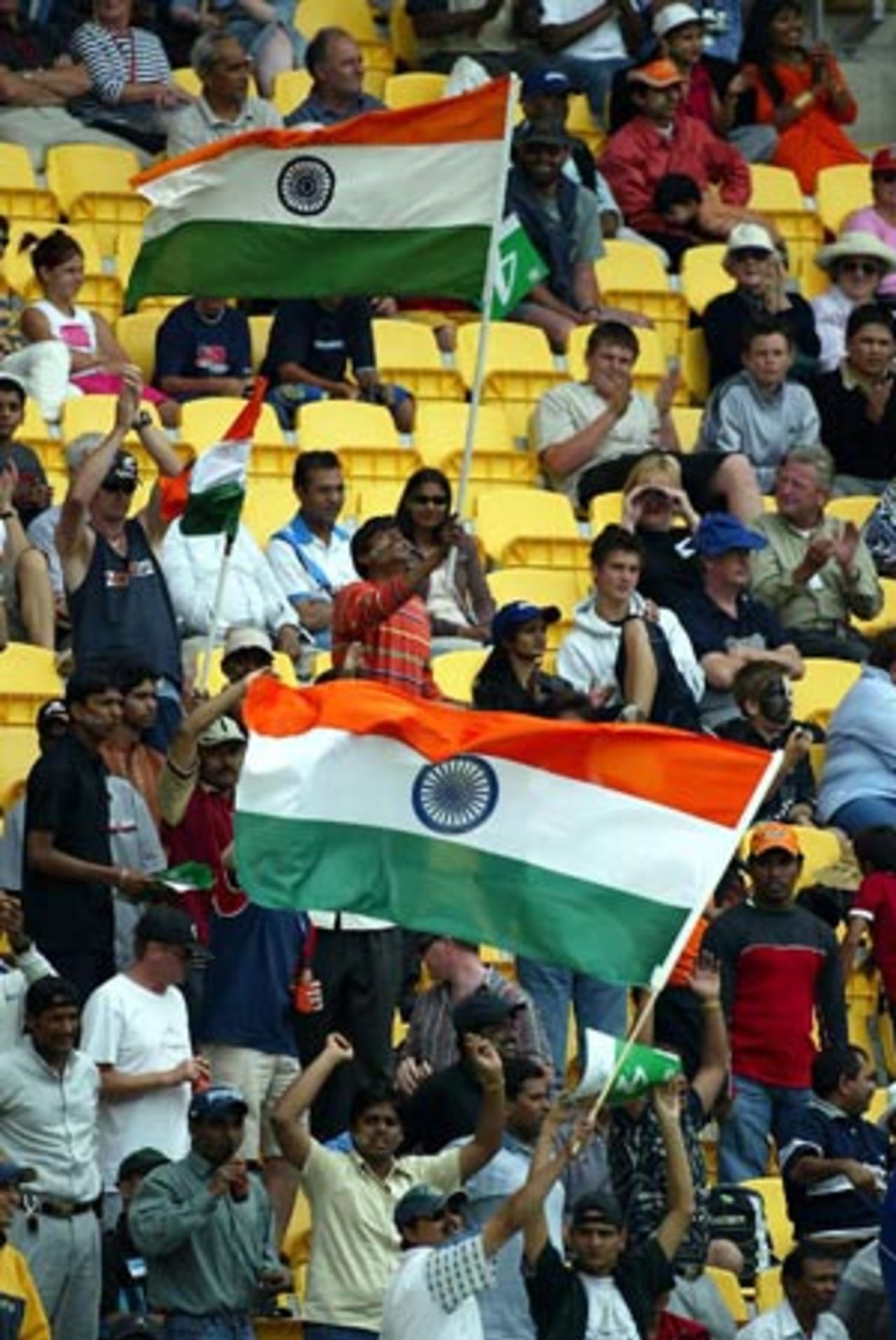 Indian fans watch the action. 5th ODI: New Zealand v India at Westpac Stadium, Wellington, 8 January 2003.