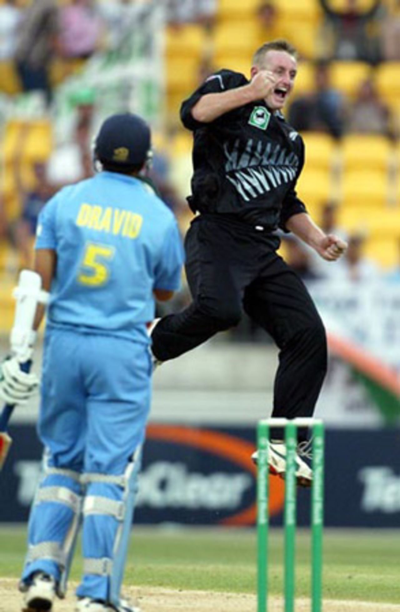 New Zealand bowler Scott Styris leaps to celebrate the dismissal of Indian batsman Rahul Dravid, caught by wicket-keeper Brendon McCullum for seven. 5th ODI: New Zealand v India at Westpac Stadium, Wellington, 8 January 2003.