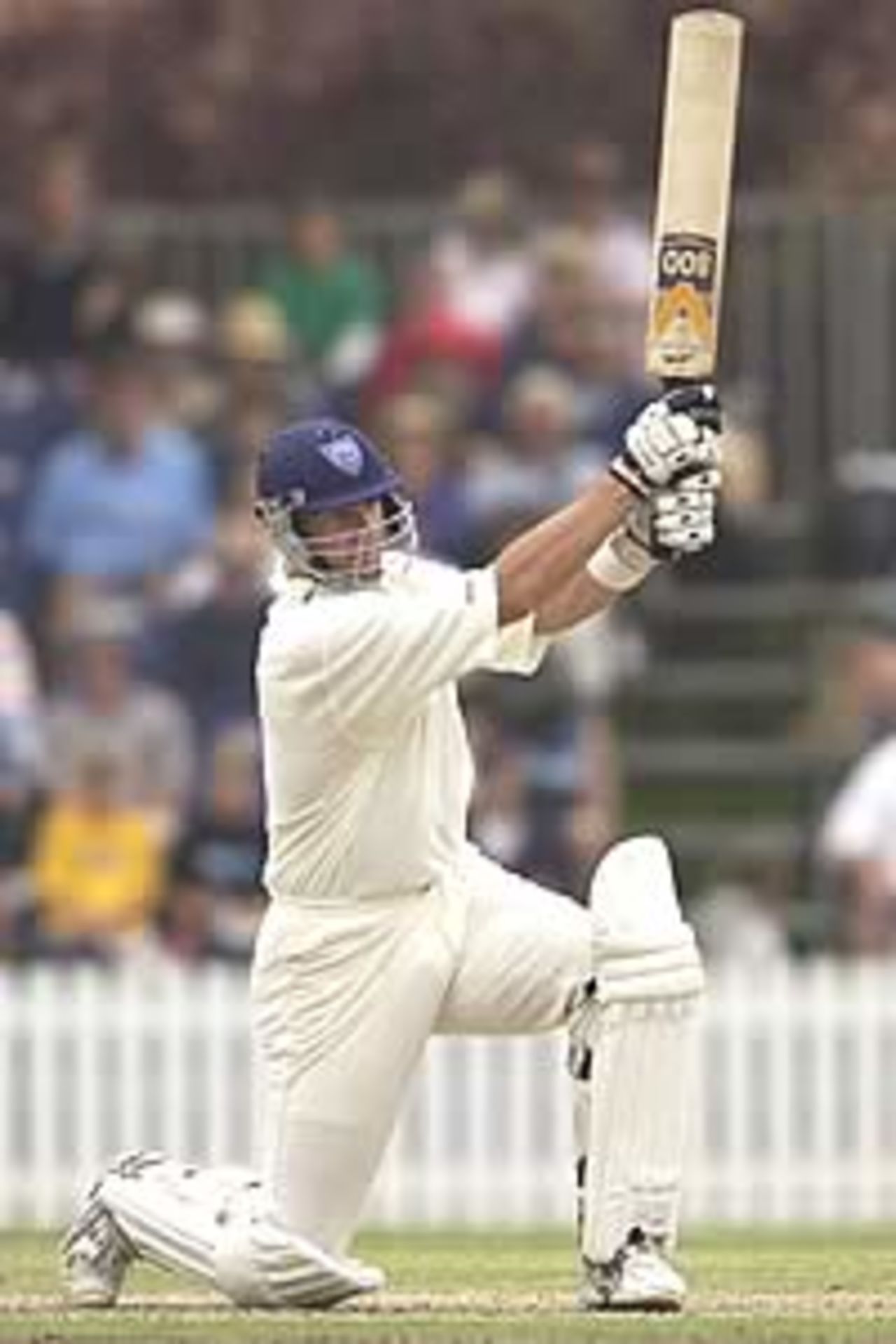 BOWRAL - JANUARY 8: Mark Waugh of the Bradmans XI hits out on his way t o a century during the Sir Donald Bradman XI v England One Day festival match at the Bradman Oval, Bowral, Australia on January 8, 2003.