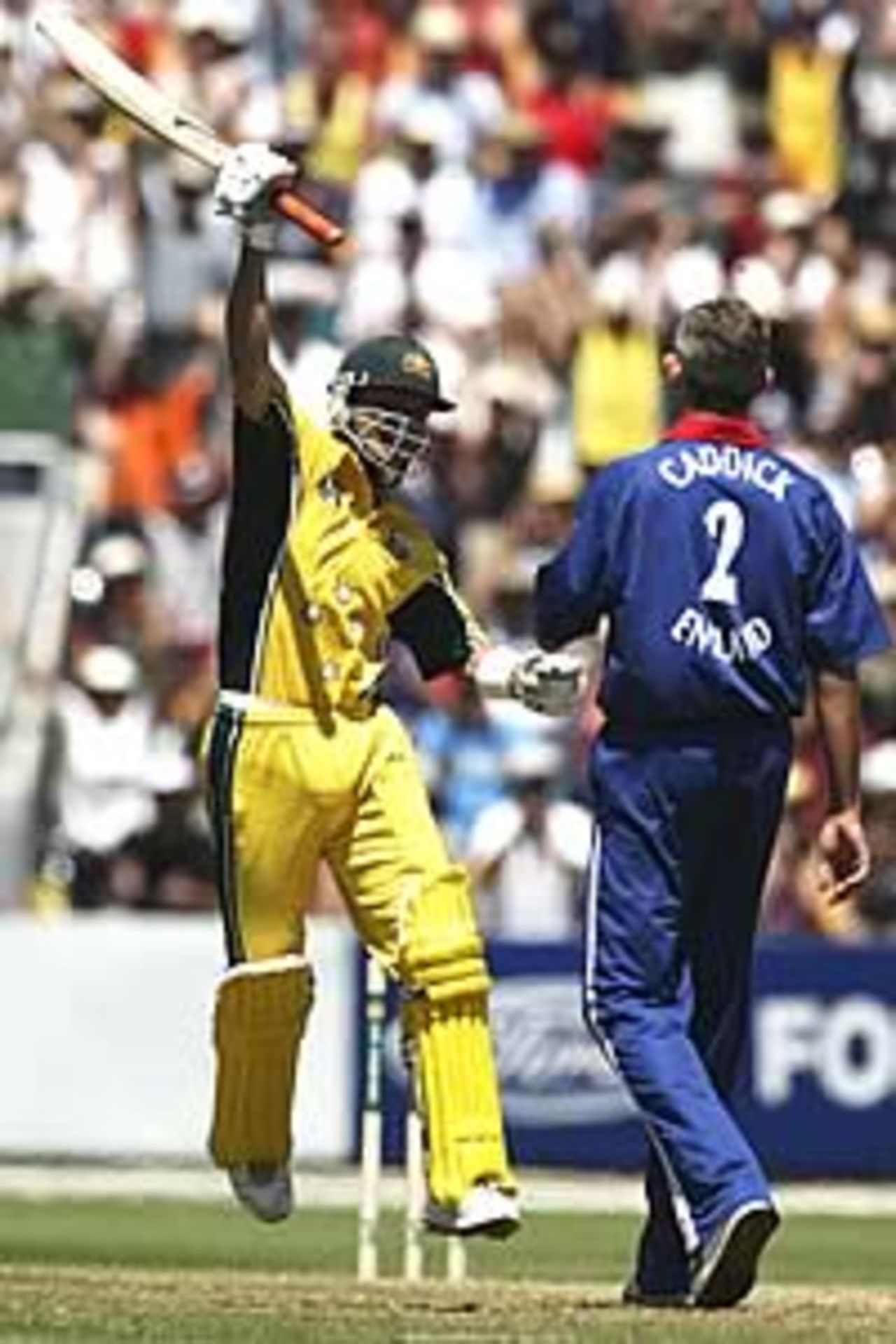 HOBART - JANUARY 11: Damien Martyn of Australia celebrates his century brought up off the last ball of the innings during the One Day International match between Australia and England at Bellerive Oval in Hobart, Australia on January 11, 2003.