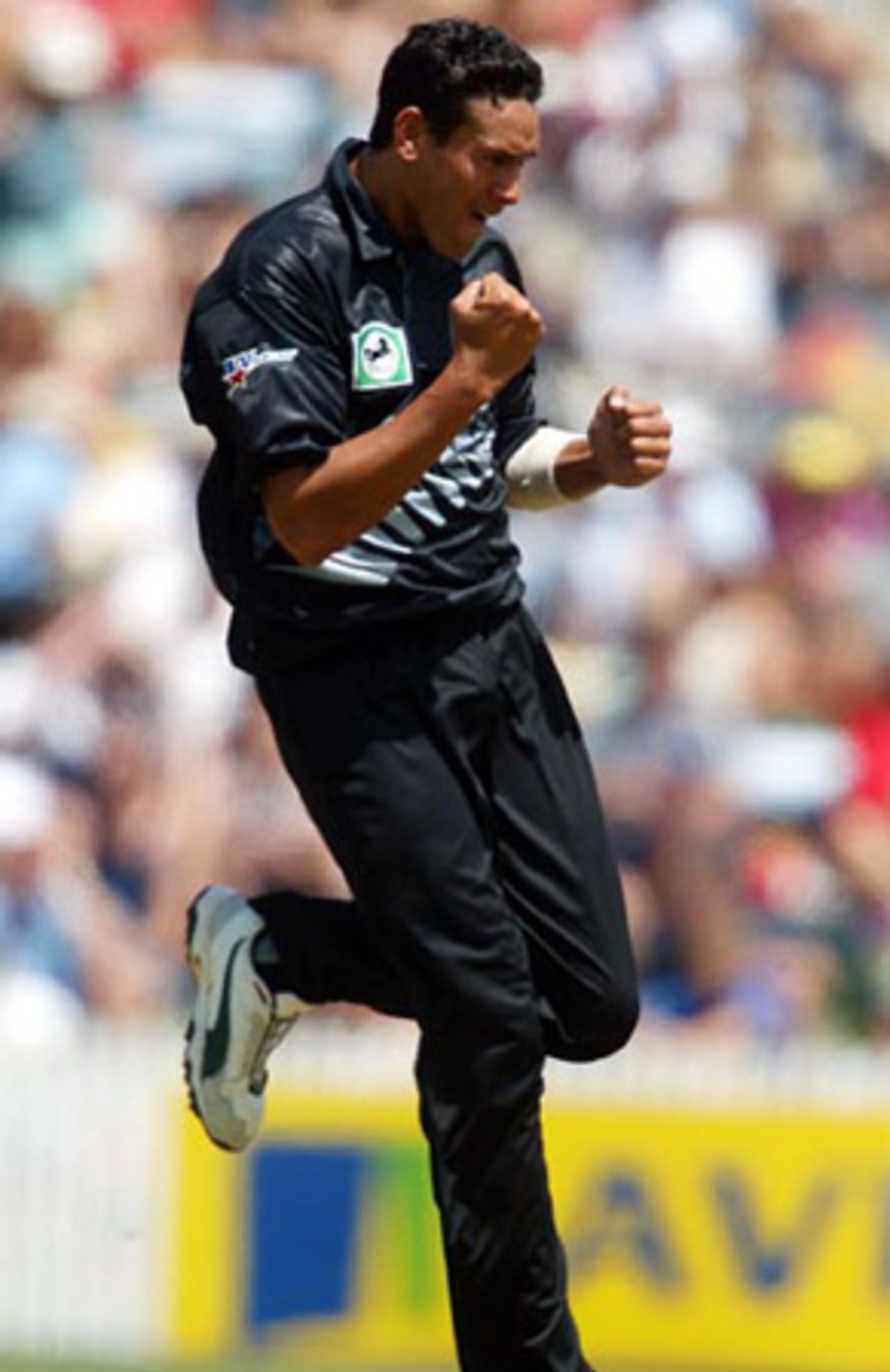 New Zealand bowler Daryl Tuffey celebrates the dismissal of Indian batsman Dinesh Mongia, caught by Stephen Fleming at first slip for 0. 7th ODI: New Zealand v India at Westpac Park, Hamilton, 14 January 2003.